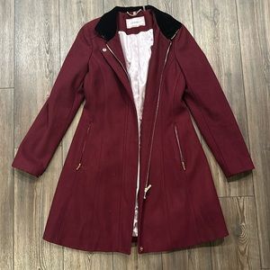 Gorgeous maroon CK coat with black velvet collar and silk lining